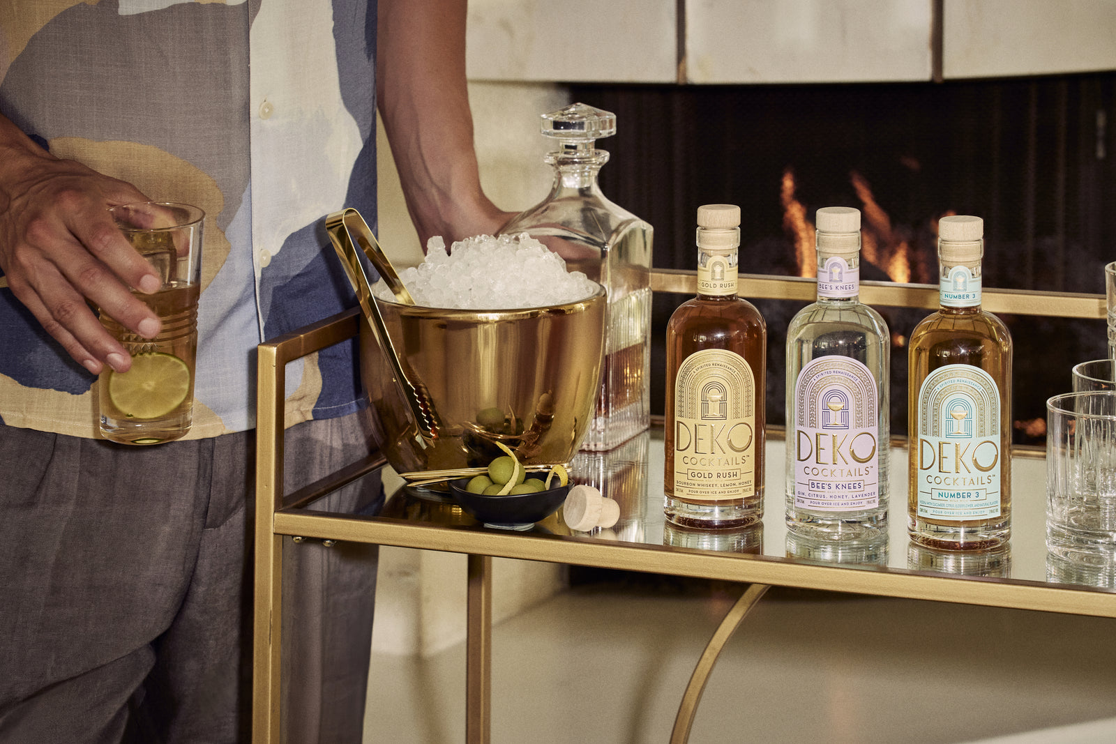 Deko Cocktails bottles on a bar cart