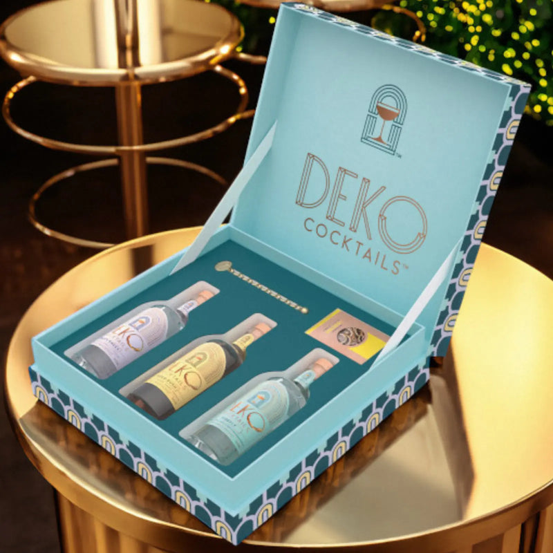 Summer cocktail flavors gift set with three DEKO Cocktails bottles in an elegant blue box